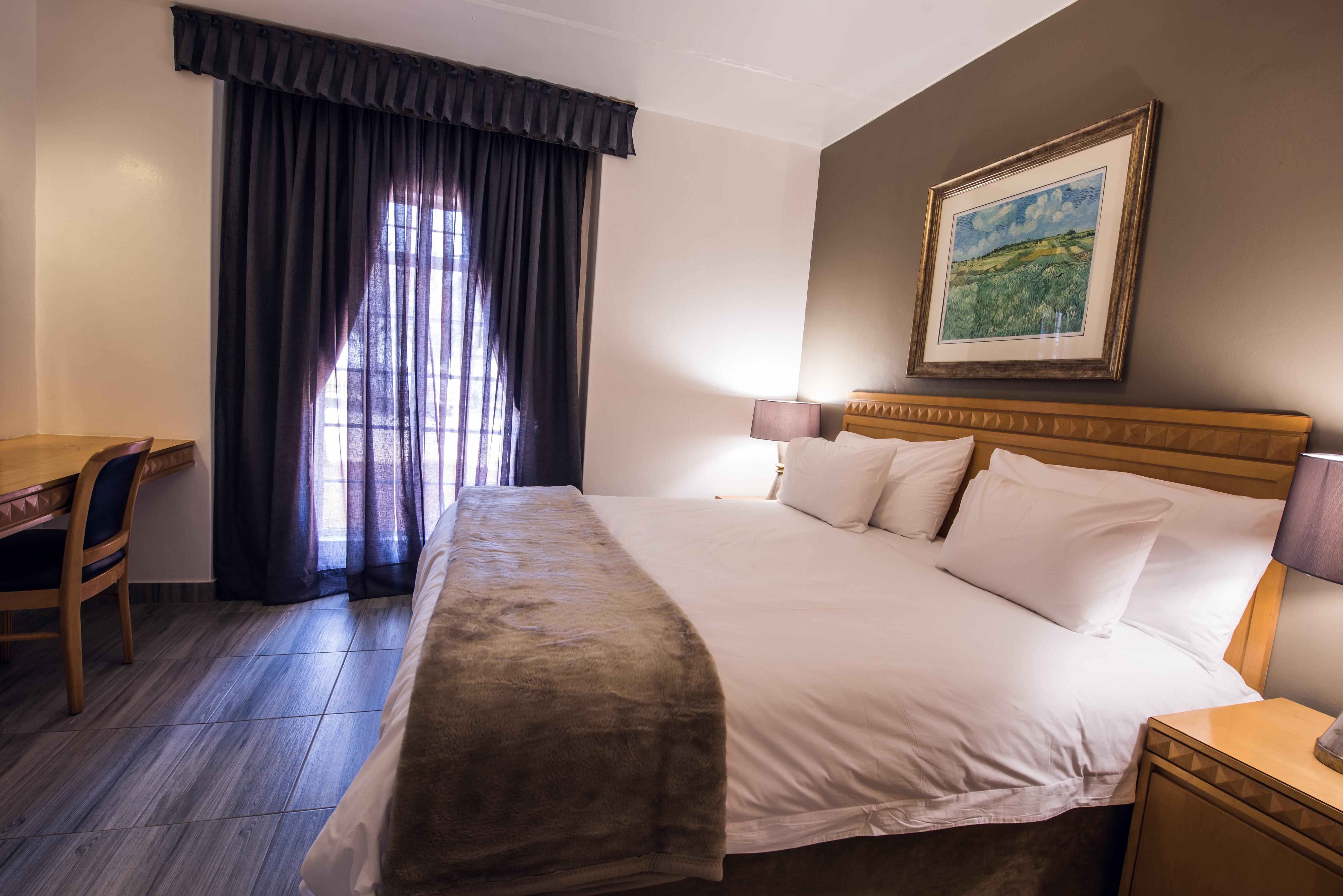 Airport Inn And Suites Іденвейл Екстер'єр фото