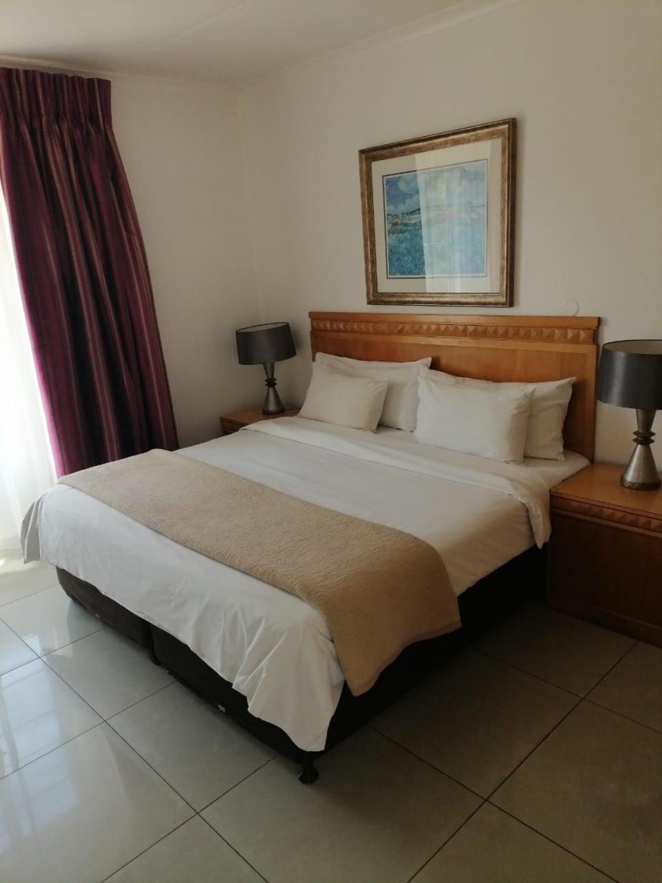 Airport Inn And Suites Іденвейл Екстер'єр фото